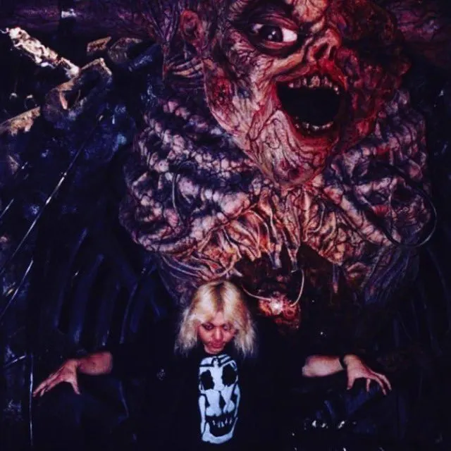 Image shared in a source post about Screaming Mad George or his work.