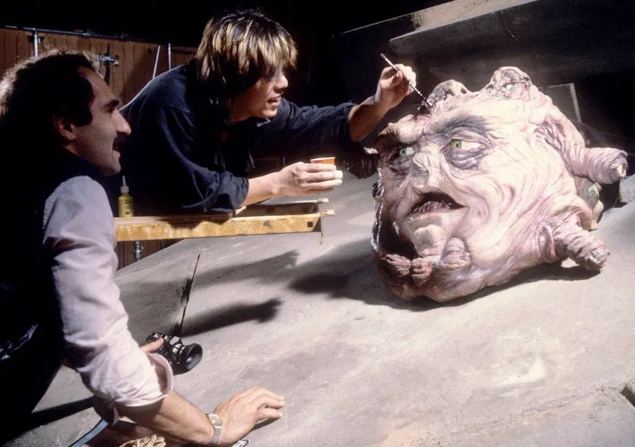 Image shared in a source post about Screaming Mad George or his work.