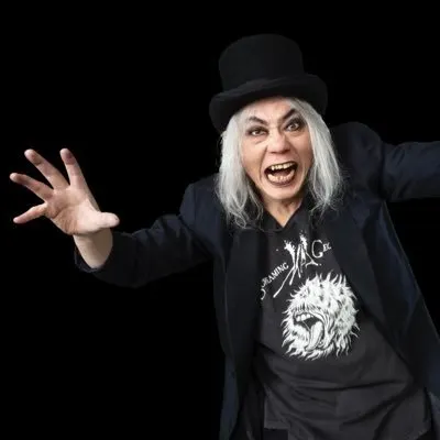 Image shared in a source post about Screaming Mad George or his work.