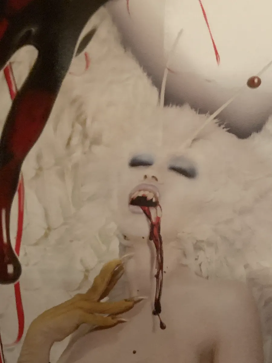 Image shared in a source post about Screaming Mad George or his work.