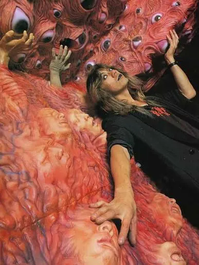 Image shared in a source post about Screaming Mad George or his work.