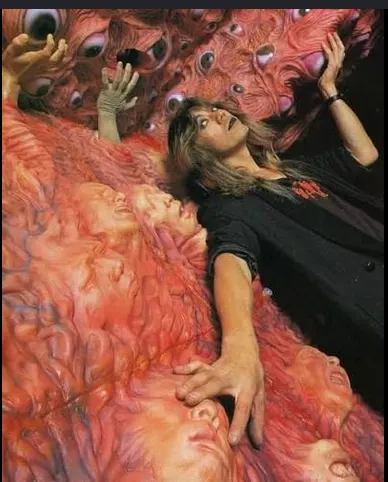 Image shared in a source post about Screaming Mad George or his work.